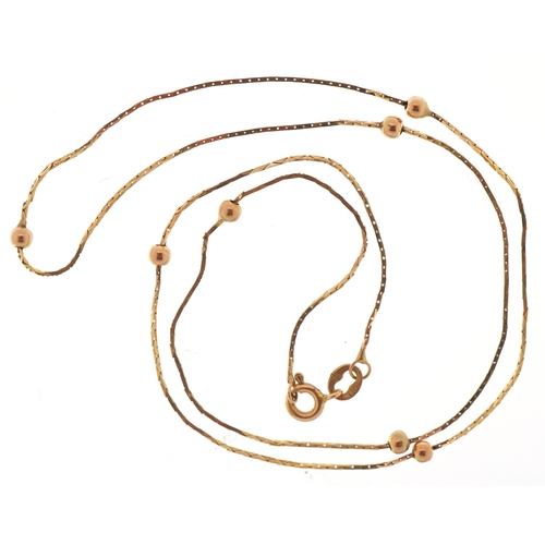 3127 - A 9ct gold ball link necklace, 42cm high in length, 1.6g.