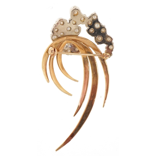 3010 - An unmarked two tone gold cultured pearl naturalistic brooch, 6cm in length, 10.0g.