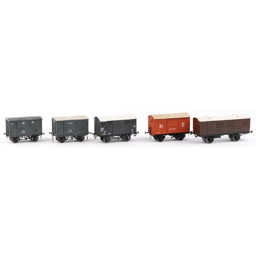 775 - Five vintage O gauge model railway wagons, the largest 18cm in length.