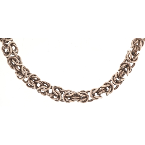 3551 - A white metal Byzantine link necklace, 60cm in length, 167.2g.
