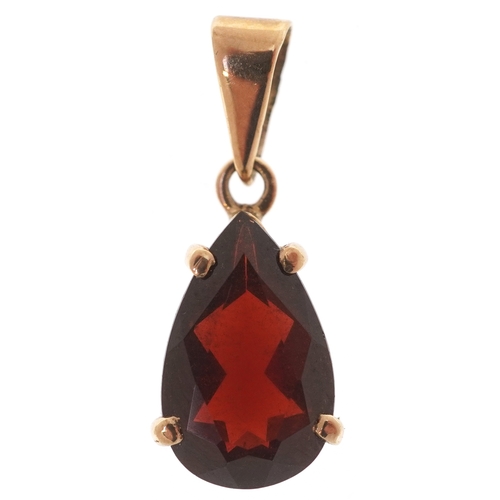 3292 - A 9ct gold teardrop garnet pendant, 1.2cm high, 1.6g.