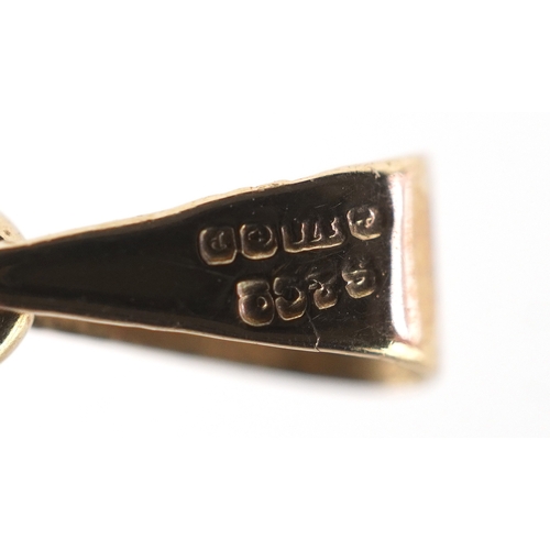 3292 - A 9ct gold teardrop garnet pendant, 1.2cm high, 1.6g.