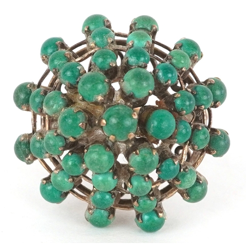 3305 - A 14K gold green stone five tier cluster ring, size H, 5.0g.