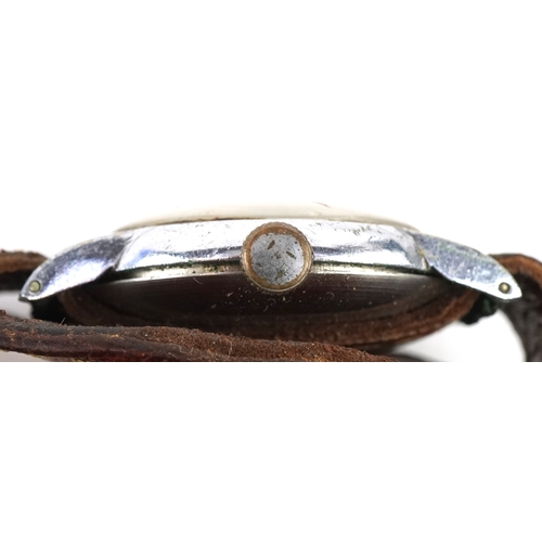 3390 - Four vintage and later wristwatches including a Russian example, Roamer and Kahuna.