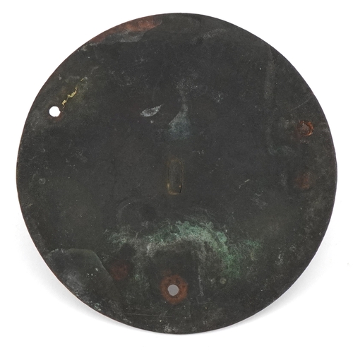 1798 - A bronze sundial with engraved decoration, dated 1692 , 13cm in diameter.