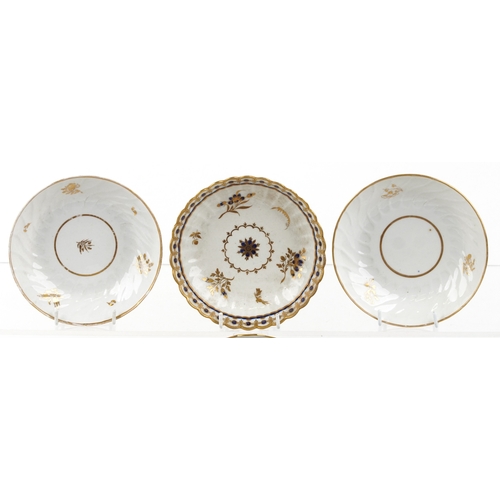 542 - 19th century English fluted and scalloped porcelain including teacups, tea bowls and saucers, the la... 