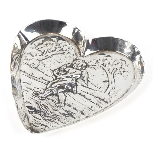 3598 - John Septimus Beresford, a Victorian silver love heart pin dish embossed with a Putto, London 1884, ... 