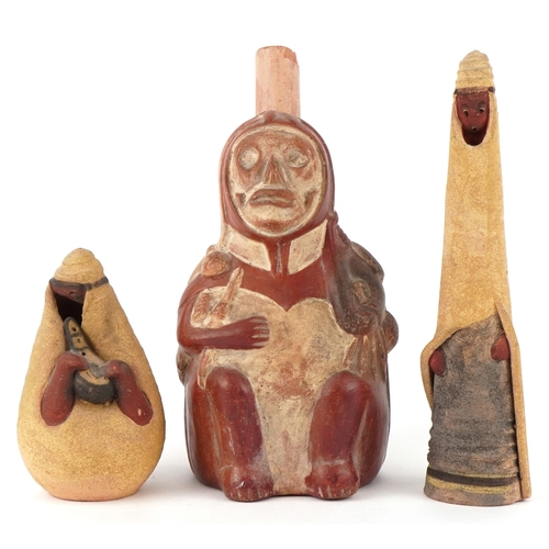 1832 - Two Middle Eastern pottery figures inscribed Jerusalem to the bases together with a stirrup spout ve... 