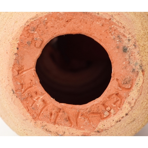 1832 - Two Middle Eastern pottery figures inscribed Jerusalem to the bases together with a stirrup spout ve... 