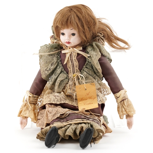 735 - A Jessica George Creation porcelain head English doll - Rachel, with lace clothing, 51cm high.