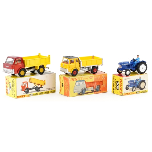 711 - Three Dinky diecast vehicles with boxes comprising Ford D800 Tipper Truck number 438, Leyland 384 Tr... 