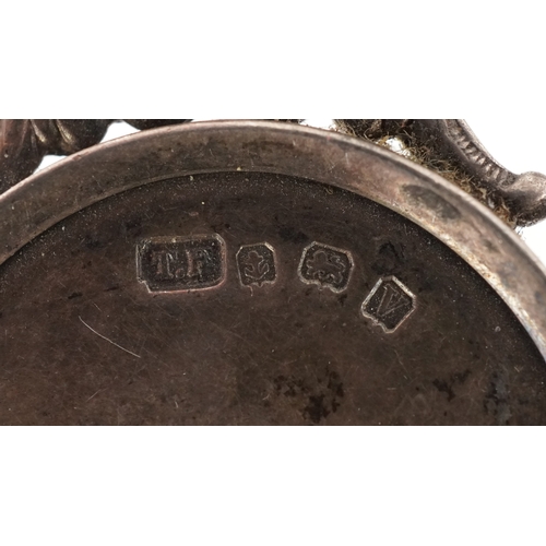 1353 - Six antique silver sports jewels including two enamelled dart boards, mounted on a silver chain, tot... 