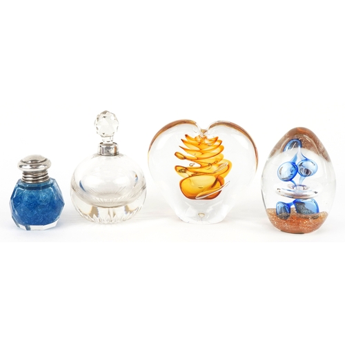 1614 - Two colourful glass paperweights and two cut glass scent bottles with silver mounts, the largest 8.5... 