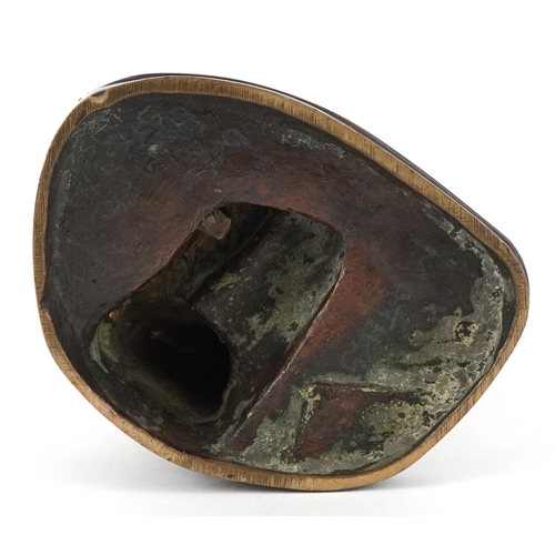 225 - A 20th century patinated bronze study of a seated young female, impressed Susse Frès. 12cm high.