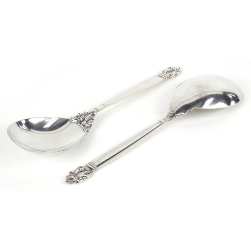 3731 - A pair of Georg Jensen Danish sterling silver serving spoons in the acorn pattern, London import mar... 