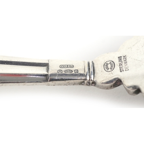 3731 - A pair of Georg Jensen Danish sterling silver serving spoons in the acorn pattern, London import mar... 