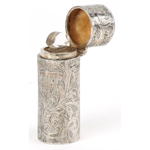 3602 - Horton & Allday, a Victorian silver cased scent bottle with glass liner and stopper chased with scro... 