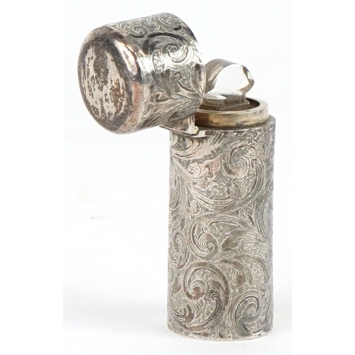 3602 - Horton & Allday, a Victorian silver cased scent bottle with glass liner and stopper chased with scro... 