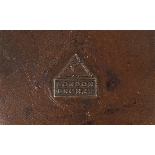 499 - Two ashtrays comprising a London Bronze ashtray embossed with animals and a Cornish serpentine ashtr... 