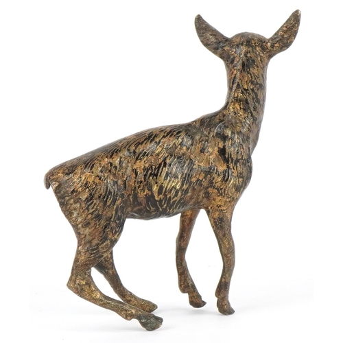 229 - An German cold painted bronze deer, impressed Geschutzt to the base, 8cm high.