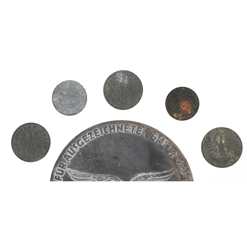 2742 - A German military interest World War II Hermann Göring medal with a selection of German coins, the m... 