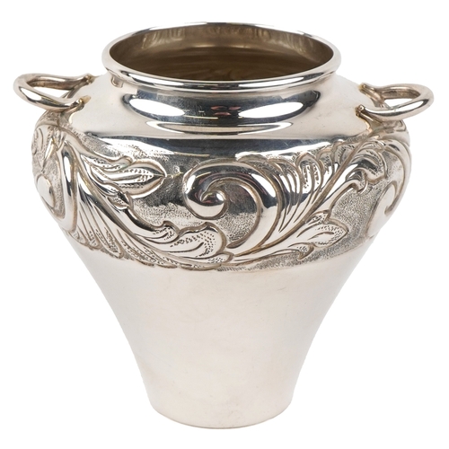 3721 - A Kappa Gallery Greek silver vase with embossed decoration, 10cm high, 159.0g.