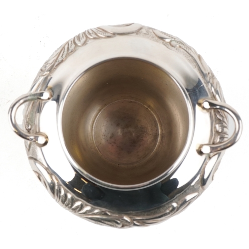 3721 - A Kappa Gallery Greek silver vase with embossed decoration, 10cm high, 159.0g.