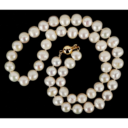 3299 - A cultured pearl necklace with a 14K gold clasp, 44cm in length, 47.0g.