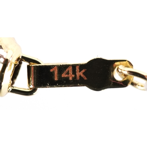 3299 - A cultured pearl necklace with a 14K gold clasp, 44cm in length, 47.0g.