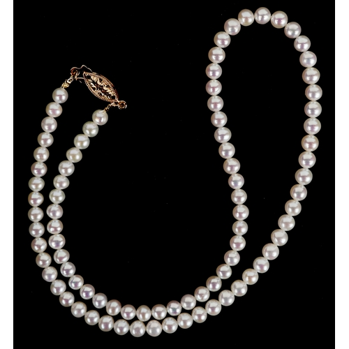 3288 - A cultured pearl necklace with a 14K gold clasp, 44cm in length, 17.7g.