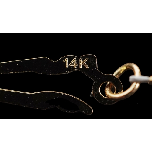 3288 - A cultured pearl necklace with a 14K gold clasp, 44cm in length, 17.7g.