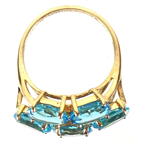 3186 - A 10K gold topaz cluster ring, size P, 5.7g.