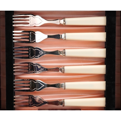 3754 - A collection of plated cutlery sets including teaspoons, sugar tongs and a knife and fork set togeth... 