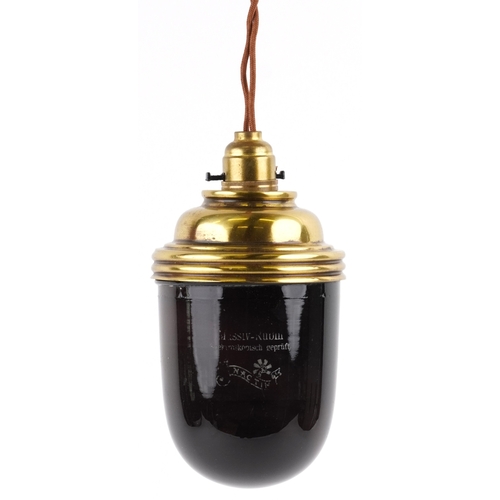 316 - A German Nactin Massiv-Rubin photography safety light with glass dome and brass mount, 20cm high.