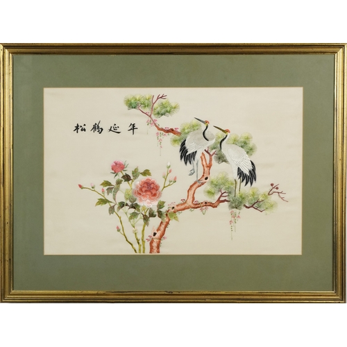 568 - A Chinese silk work embroidery depicting cranes amongst foliage, mounted, framed and glazed, 38cm x ... 