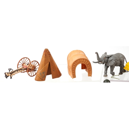 779 - A large collection of vintage toys including farmyard animals, cowboys & Indians and model soldiers.