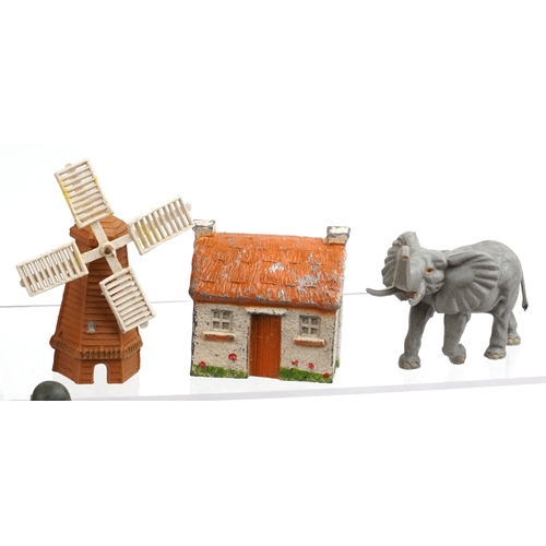 779 - A large collection of vintage toys including farmyard animals, cowboys & Indians and model soldiers.