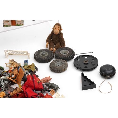 779 - A large collection of vintage toys including farmyard animals, cowboys & Indians and model soldiers.