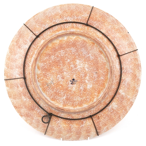 444 - Charlotte Rhead for Crown Ducal, a hand painted Rhodian pattern charger, 44cm in diameter.