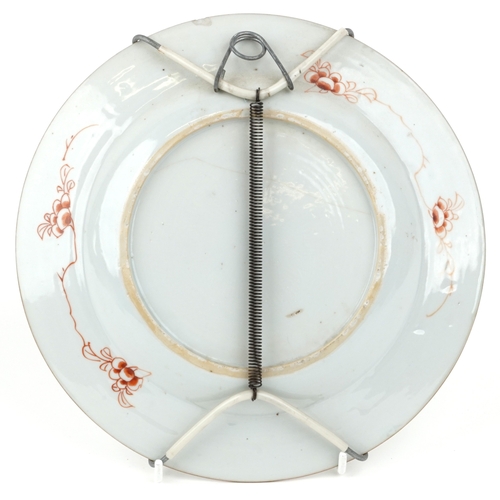 470 - A Chinese porcelain plate hand painted with flowers, 22cm in diameter.