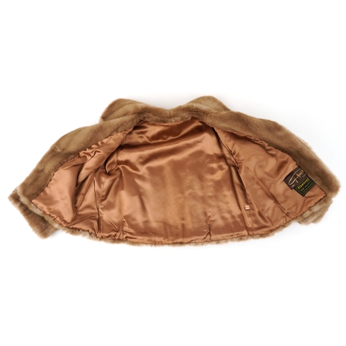 1037 - A Tissavel ladies faux fur jacket, pit to pit 52cm, 50cm in length.