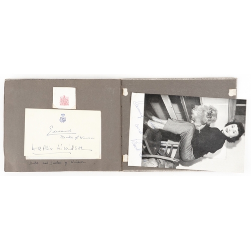 A 1950s and later collection of autographed black and white pictures of film stars, musicians and the Duke and Duchess of Windsor - Edward & Wallace Windsor including Gladys Morgan, Ruby Murray, Phil Tate, The Stranglers, Wallas Eaton, Dickie Henderson, Anne Crawford, Sue Boswell, Edward O'Henry, Rupert Davies, The King Brothers and Dick Emery, arranged in an album.