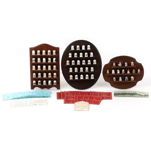 668 - Collectable porcelain thimbles with display stands including The Garden Birds Thimble Collection and... 