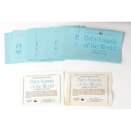 668 - Collectable porcelain thimbles with display stands including The Garden Birds Thimble Collection and... 