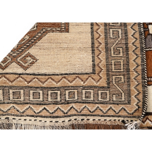 2203 - A Persian runner, the ivory field with four central medallions within a grey border, 212cm x 102cm.