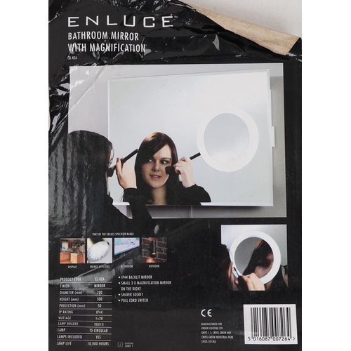 2193 - An as new Enluce bathroom mirror with magnification.