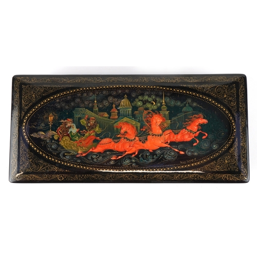 1570 - Four Russian lacquered papier mâché boxes, each hand painted with traditional folk art, the largest ... 