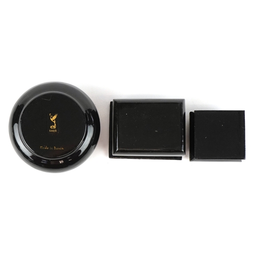 1570 - Four Russian lacquered papier mâché boxes, each hand painted with traditional folk art, the largest ... 