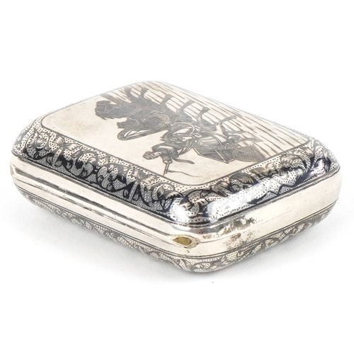 3596 - A Russian silver niello work box decorated with a three horse drawn troika, standard 84, 6.4cm wide,... 