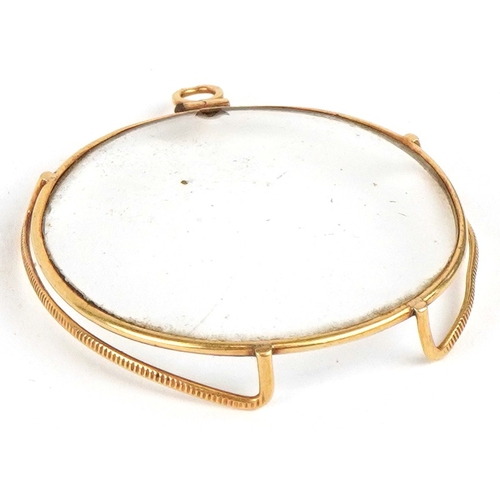 300 - An antique French 18K gold monocle, 4.5cm high, 7.3g.